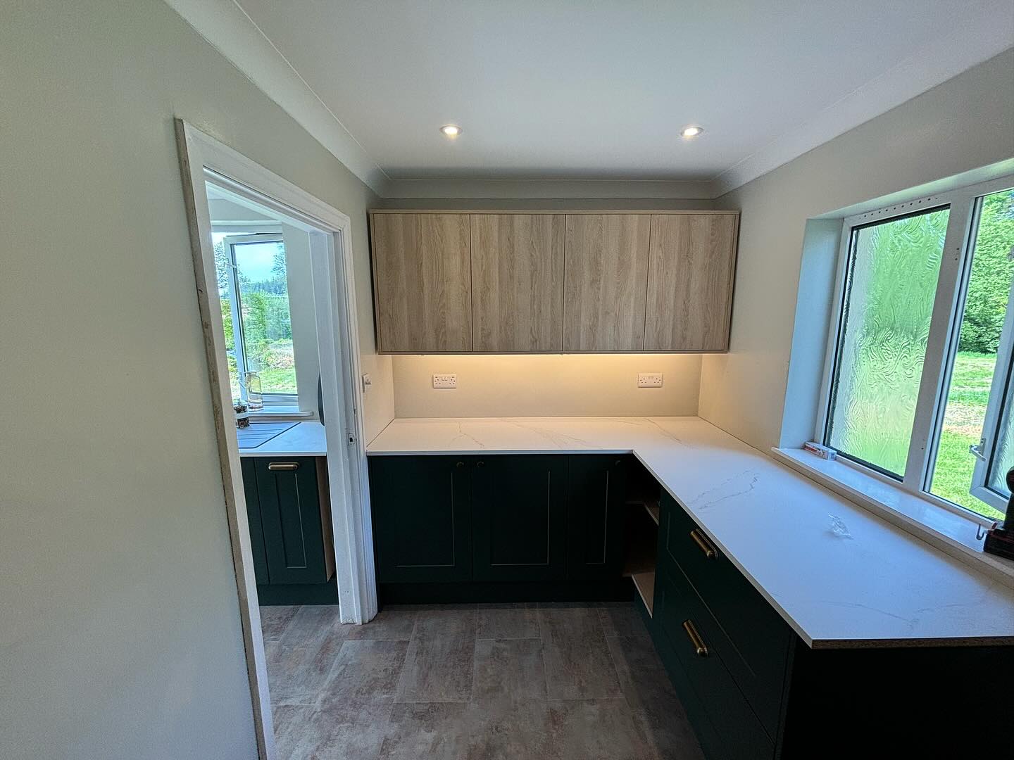 Corner units with an LED strip under the wall cabinets