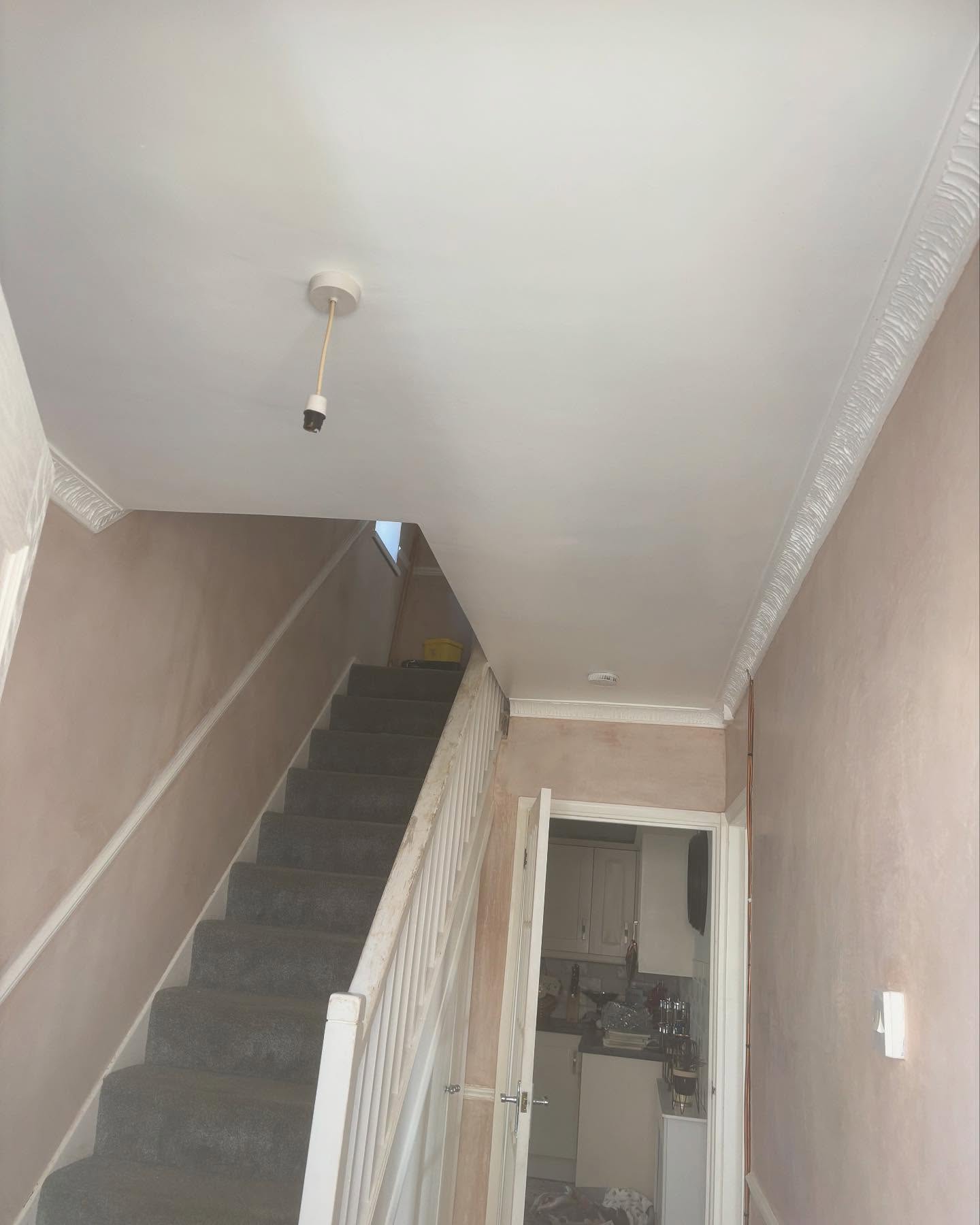 Hallway and stairs with the old single pendant light